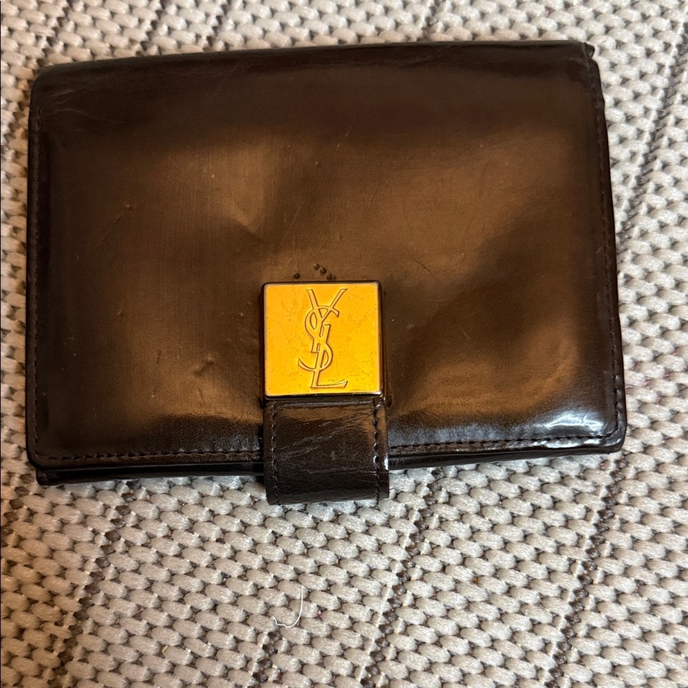 Yves Saint Laurent Brown Wallet with Gold Detail.